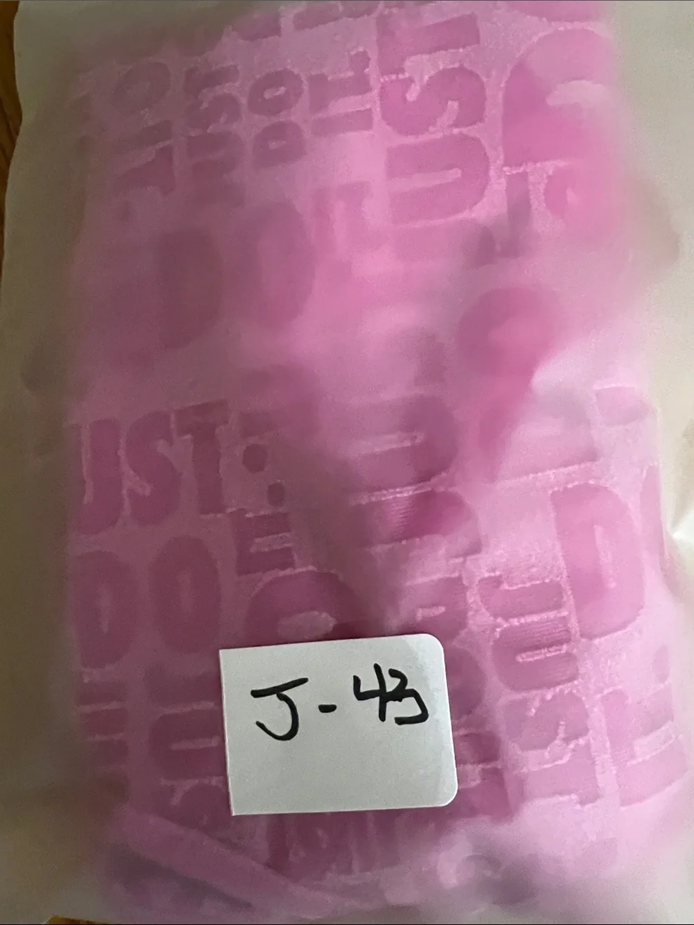 Nike Pink All-Over 'Just Do It' Muscle Tank